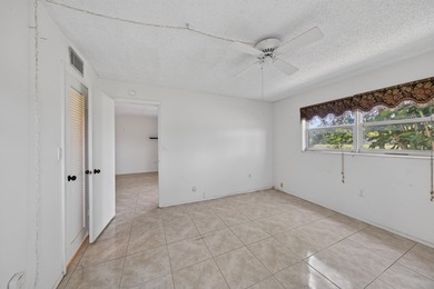 Desirable first-floor end unit in Sunrise Lakes Phase One! This - photo 8
