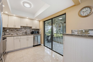 Beautifully updated first-floor condominium offering the perfect - photo 1