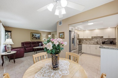 Beautifully updated first-floor condominium offering the perfect - photo 7