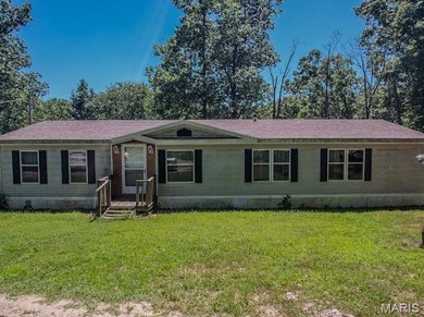 (private lake, pond, creek) Home Sale Pending in Lebanon Missouri