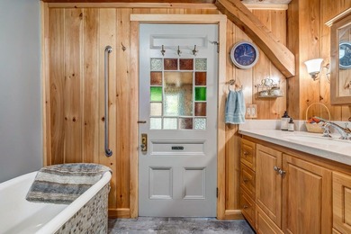 This stunning post-and-beam home on scenic Sennebec Pond offers - photo 33