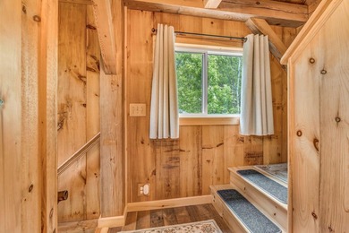 This stunning post-and-beam home on scenic Sennebec Pond offers - photo 34