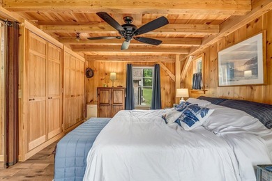 This stunning post-and-beam home on scenic Sennebec Pond offers - photo 38