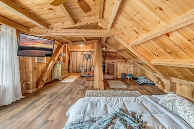 This stunning post-and-beam home on scenic Sennebec Pond offers - photo 42