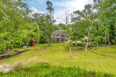This stunning post-and-beam home on scenic Sennebec Pond offers - photo 44