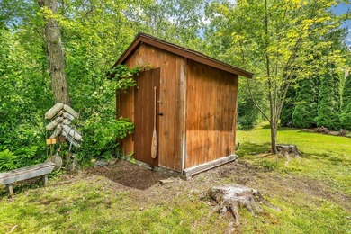 This stunning post-and-beam home on scenic Sennebec Pond offers - photo 48