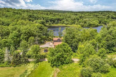 This stunning post-and-beam home on scenic Sennebec Pond offers - photo 50
