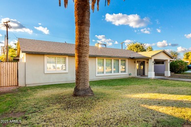 Step inside this uniquely crafted mid-century home in downtown