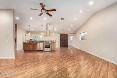 Step inside this uniquely crafted mid-century home in downtown