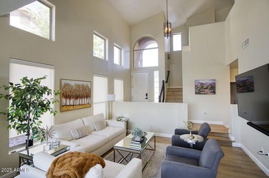 Gorgeous remodeled gated home in Las Sendas! Enter through the