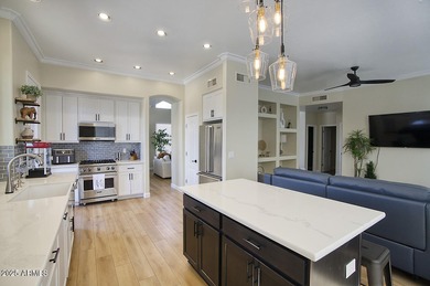 Gorgeous remodeled gated home in Las Sendas! Enter through the
