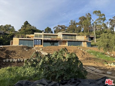 Currently mid-construction and sold *as-is* with fully approved - photo 2