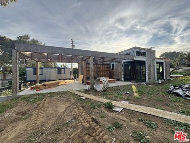 Currently mid-construction and sold *as-is* with fully approved - photo 7