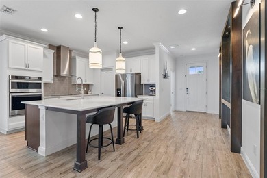 Welcome home to this beautifully upgraded 4-bedroom, 2-bathroom - photo 9