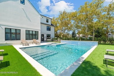 An elegant 8 bedroom, 5 bathroom coastal residence with a - photo 15