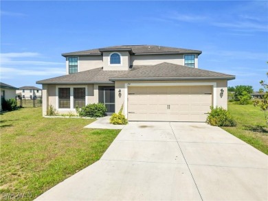Lake Home For Sale in Lehigh Acres, Florida