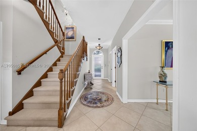 Perfectly situated on a quiet, tree-lined street in one of Coral - photo 3