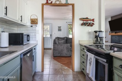 This beautifully updated 3 bedroom 2 bath cabin offers - photo 23