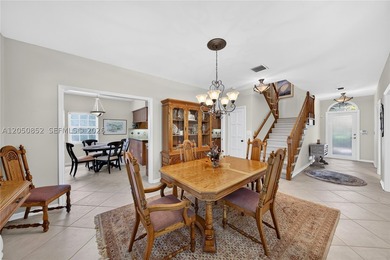 Perfectly situated on a quiet, tree-lined street in one of Coral - photo 7