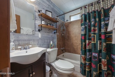 This beautifully updated 3 bedroom 2 bath cabin offers - photo 32