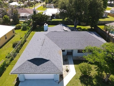 Welcome to this charming single-story residence located in Port - photo 2