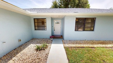 Welcome to this charming single-story residence located in Port - photo 4