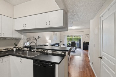 RARELY AVAILABLE CORNER UNIT! Charming 2 bedroom, 2.5 bath - photo 3
