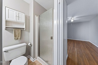 Beautifully updated end-unit townhome offering 3 bedrms & 3 full