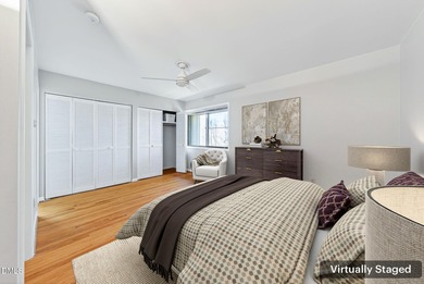 Beautifully updated end-unit townhome offering 3 bedrms & 3 full