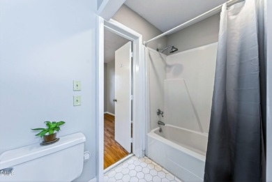 Beautifully updated end-unit townhome offering 3 bedrms & 3 full