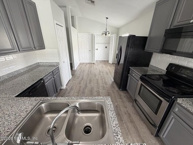 ** Price Adjustment ** This 4 bedroom, 2 bath home includes an - photo 4