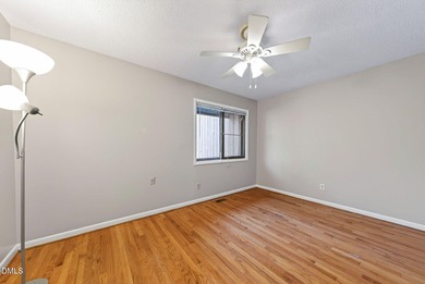 Beautifully updated end-unit townhome offering 3 bedrms & 3 full