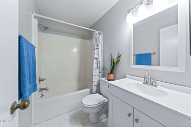 Beautifully updated end-unit townhome offering 3 bedrms & 3 full