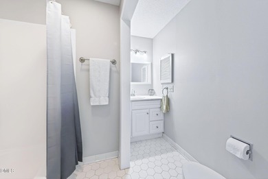 Beautifully updated end-unit townhome offering 3 bedrms & 3 full