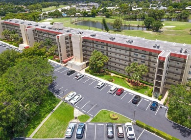 WELCOME TO THIS CONVENIENT GOLF FRONT CONDO! LIFE IS A BIT - photo 34