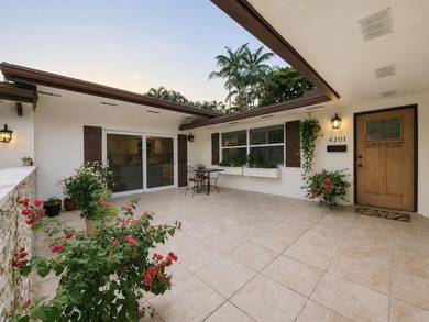 Welcome to this one-of-a-kind tropical retreat in the highly - photo 2