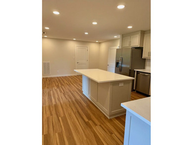 Completely rebuilt & renovated from the studs up, this - photo 7