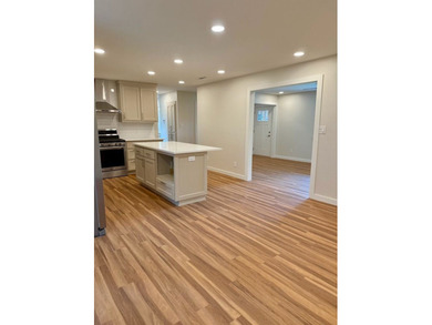 Completely rebuilt & renovated from the studs up, this - photo 8