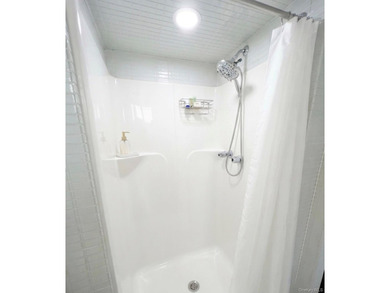 Charming detached home featuring 2 spacious bedrooms and 2 full - photo 11