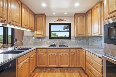 Discover a rare standalone residence within The Bluffs, a gated - photo 10