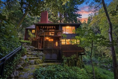 An enchanting riverside retreat awaits you in Brookdale. This - photo 1