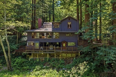 An enchanting riverside retreat awaits you in Brookdale. This - photo 3