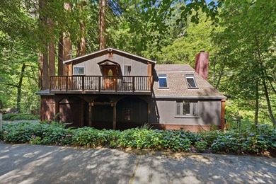 An enchanting riverside retreat awaits you in Brookdale. This - photo 4