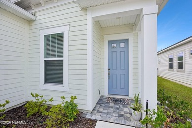 Welcome home to the highly sought-after 55+ golf cart community - photo 3
