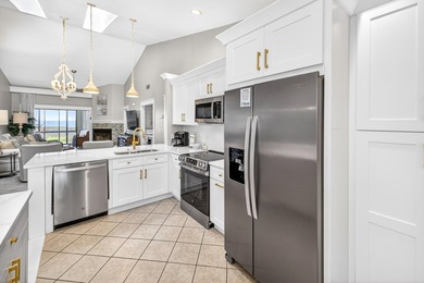 STUNNING UPSTAIRS CONDO WITH SWEEPING BAY & MARINA VIEWS IN - photo 16