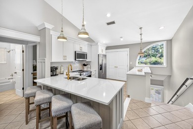 STUNNING UPSTAIRS CONDO WITH SWEEPING BAY & MARINA VIEWS IN - photo 22