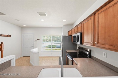 Price reduced!!! Move-in ready townhome in gated community with - photo 10