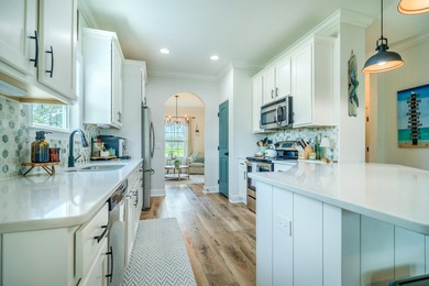 Coastal style and modern upgrades come together beautifully in - photo 28