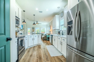 Coastal style and modern upgrades come together beautifully in - photo 29