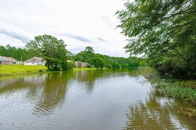 Experience peaceful lakefront living in this beautifully - photo 6